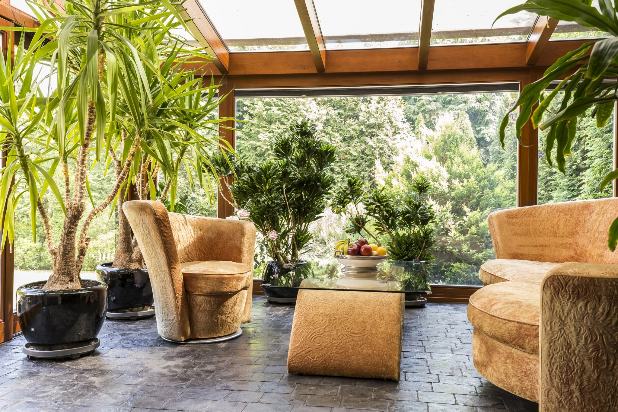 Spacious Indoor Orangerie With Upholstered Furniture